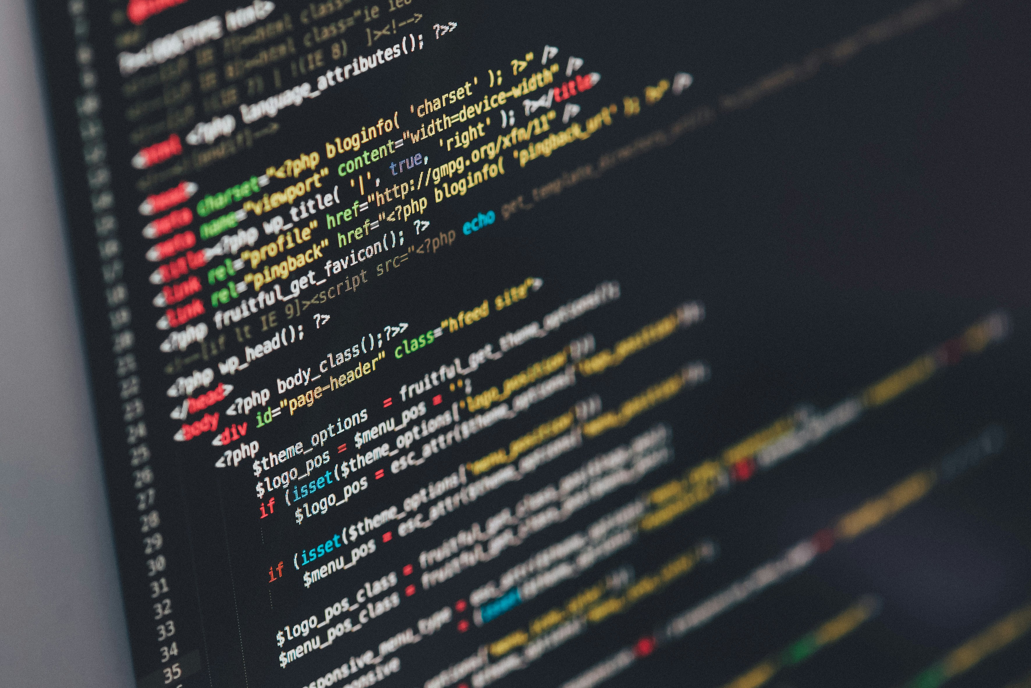 Java programming code displayed on monitor representing modern JavaScript runtime development and comparison