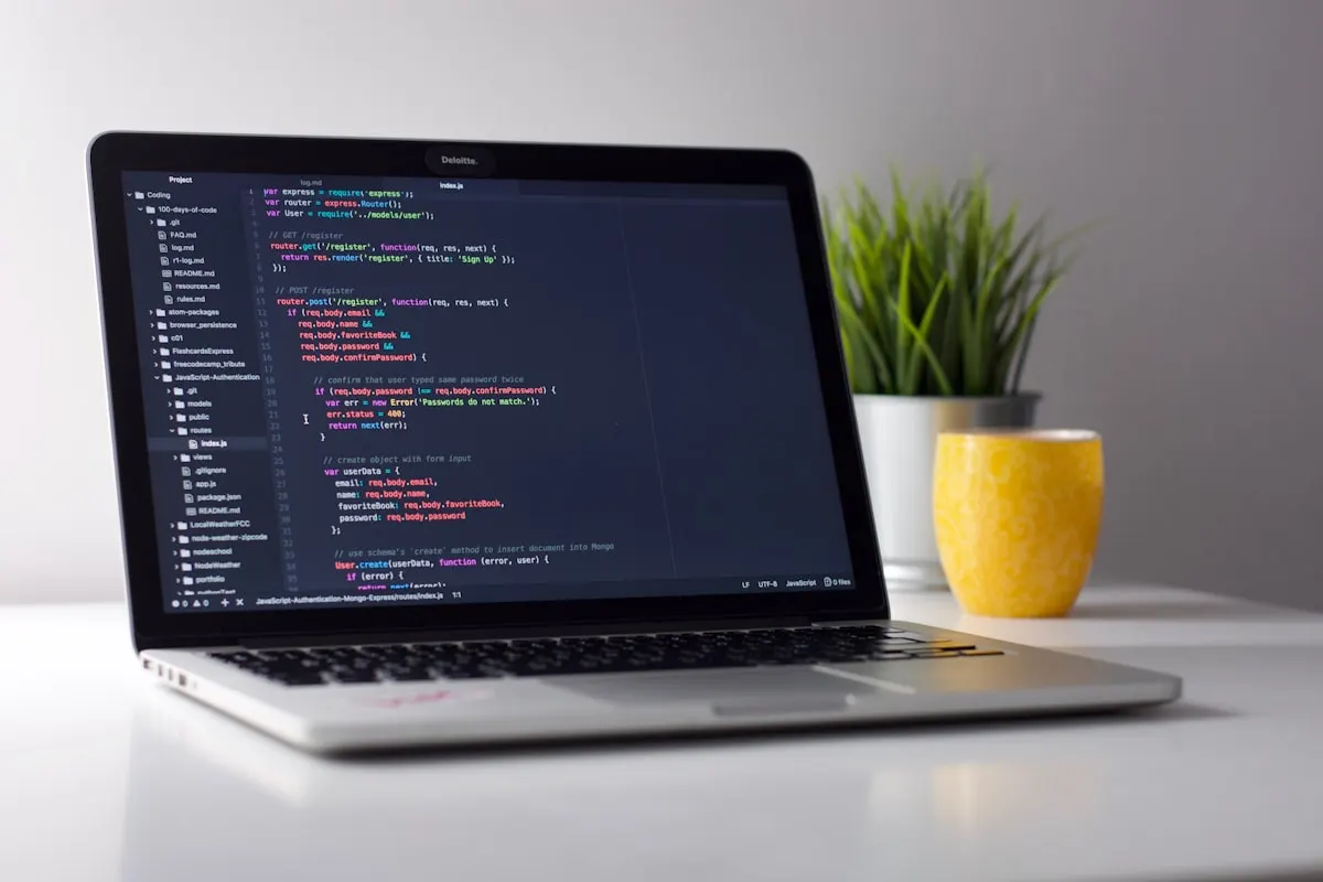 Developer desk with keyboard and coffee