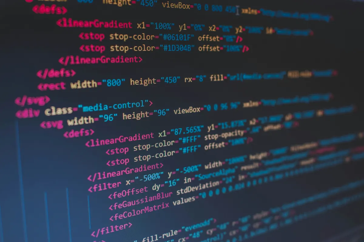 Developer workspace with code editor showing HTML and programming interface