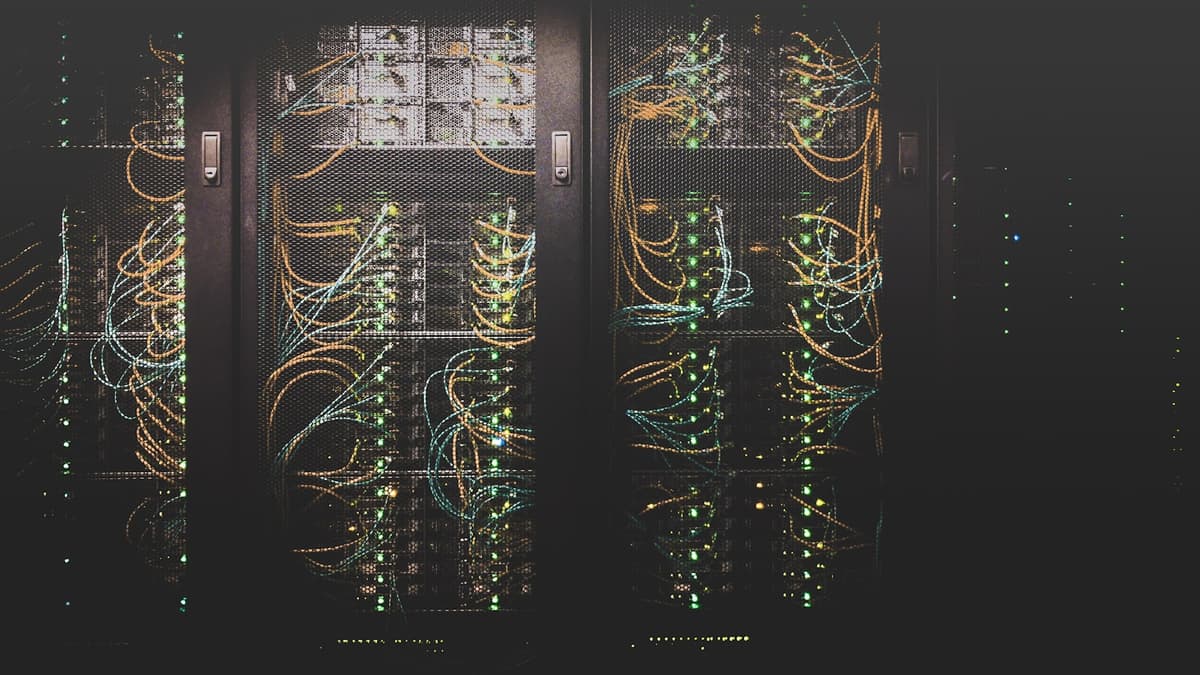 Server room representing isolated workspaces for AI coding agents